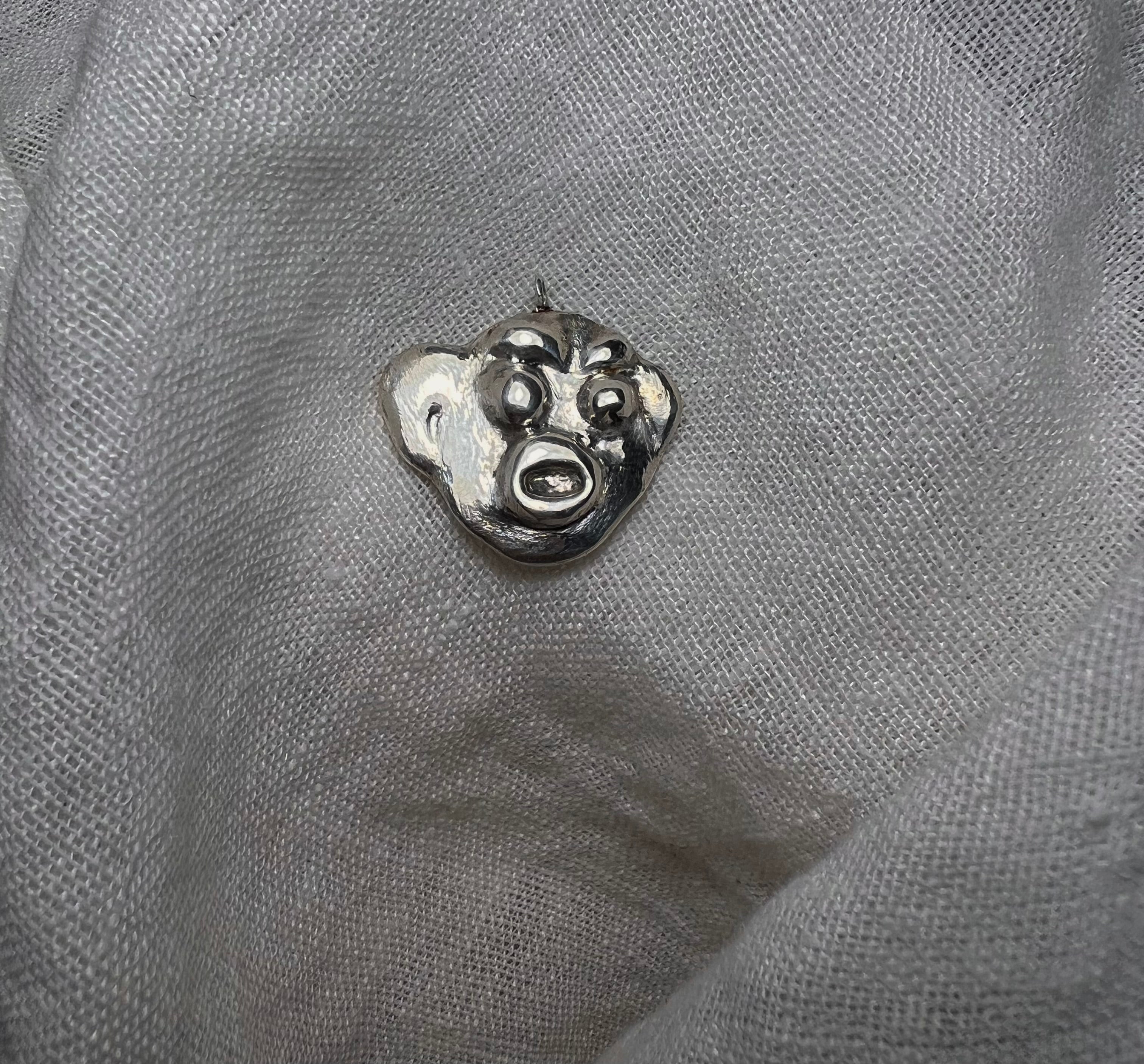 Funk face pendant